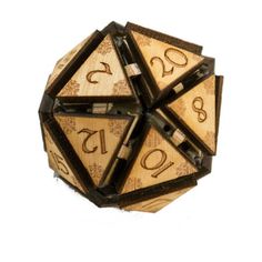 a wooden dice with numbers on it