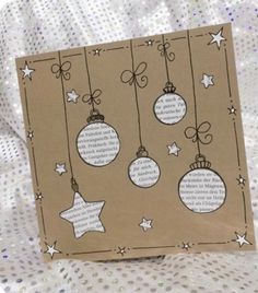 an ornament card with christmas ornaments hanging from it