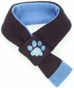 a blue and black dog scarf with a paw on it