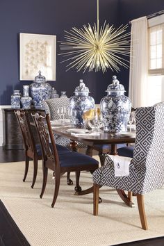 a dining room with blue and white decor