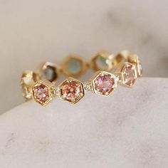 Ombre Tourmaline Hexagon Carina Eternity Band by Katie Diamond Pink Ring With Sparkling Stones, Pink Diamond Stackable Rings, Pink Diamond Multi-stone Jewelry, Pink Crystal Rings For Wedding, Rose Gold Multi-stone Jewelry With Pink Sapphire, Pink Sapphire Multi-stone Jewelry For Gifts, Rose Gold Multi-stone Pink Sapphire Jewelry, Pink Stackable Round Cut Jewelry, Multi-stone Pink Sapphire Jewelry For Gifts