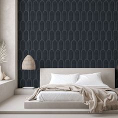 a bedroom with black and white wallpaper in the background