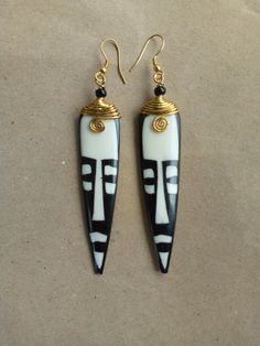 This is an African handmade earrings. It's fully handcrafted and unique. Simple and light in weight. Perfect gift for women. Listing for one pair of earrings. Dimensions 6 cm long Custom orders are welcome Dhl shipping express. Thank you Bone Earrings, African Mask, Women Earrings, Jewelry Essentials