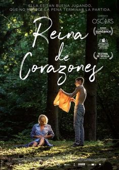 the poster for reina de coras, with two people standing in front of trees