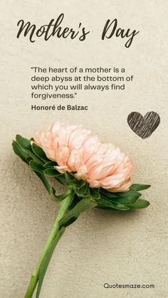 a pink flower sitting on top of a white wall next to a quote about mother's day