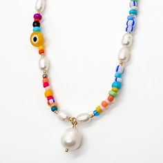 Your Beaded Necklace With Freshwater Pearl Pendant Ships Immediately From Fort Collins, Colorado! This Trendy Y2k Aesthetic Style Necklace Includes Colorful Beads With Evil Eye Charms, Flower Beads, And A Real Freshwater Pearl Pendant And Gold Clasp. This Is A Fun Necklace For Any Age And The Perfect Gift For A Teen Girl. Jewelry Care Tips: Avoid Direct Contact With Perfumes, Body Lotions And Other Chemicals. Remove Jewelry When Bathing, Showering Or Sleeping. Store Jewelry In A Cool Dry Place. Trendy Beaded Pearl Necklace For Summer, Trendy Summer Beaded Pearl Necklace, Evil Eye Choker, Jewelry 2024, Mixed Beads Necklace, Colorful Beaded Necklace, Petite Jewelry, Y2k Necklace, Fort Collins Colorado