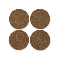 four brown woven coasters on a white background