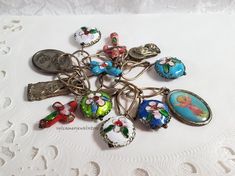 Hello, this is an unusual handmade charm religious style bracelet that I found at an estate sale. Length 8.5 inches. 12 Charms: 8 Cloisonne Charms - 5 round ones - 3 crosses - 4 metal types -  2 charms have Ruega Pot Nosotros Italy stamped on the backs. See photo #7  Charm Size: approx. 1/2 to 1.0 inch lengths.  Metal Link bracelet - handmade, teardrop shape, wire soldered.  Working clasp.  Pre-owned, good vintage condition. Please ask any questions you might have. ✦ My items are Smoke and Perfume Free ... Shop / Home / Office Thank you for visiting my store.💚 Click here... ✦ www.etsy.com/shop/SylCameoJewelsStore www.etsy.com/market/sylcameojewelsstore Victorian Bracelets With Vintage Charm As Gift, Victorian Style Bracelet With Vintage Charm For Gift, Antique Handmade Charm Bracelet For Gift, Handmade Antique Charm Bracelet For Gift, Handmade Antique Charm Bracelet As Gift, Handmade Vintage Charm Bracelet Gift, Vintage Handmade Charm Bracelet Collectible, Handmade Vintage Charm Bracelet Collectible, Vintage Medallion Bracelet For Gift