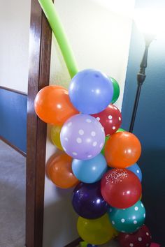 a bunch of balloons that are on the ground