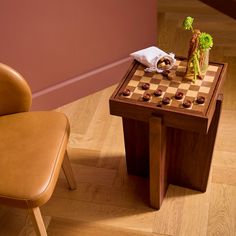 a small table with chess pieces on it