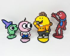 five pixelated characters are standing in a row