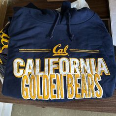 Brand New Cal Uc Berkeley Golden Bears Hoodie! -Verified By Worker Rights Consortium -Nwt -Lightweight But Soft And Fuzzy Inside! Navy Hooded Top With Letter Print, Blue Casual Hoodie For Fan Gear, Blue Team Spirit Hoodie Sweatshirt, Blue Hoodie With Letter Print For Fans, Blue Hoodie With Letter Print For Fan Gear, Blue Hoodie With Letter Print Fan Apparel, Collegiate Blue Hoodie With Letter Print, Blue Cotton Hoodie For Game Day, Casual Blue Hoodie For Game Day