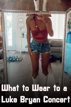 a woman standing in front of a mirror with the words what to wear to a luke ryan concert