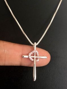 "Sterling Silver Cross Heart Rose CZ Necklace NECKLACE FEATURES: Metal: All components are made from solid .925 Sterling Silver Model is wearing 16\" in length solid .925 Sterling Silver Chain Length available: 16\", 18\" or 20\" Measurement: Height: 27mm Width: 18mm Thickness: 3.5mm Stone material: clear cubic zirconia Stone shape: round Total number of CZ stones: 12 Your Cross Heart CZ Necklace will arrive in a gift box, beautifully wrapped and ready for gifting Please send me a convo if you h Sterling Silver Cross Necklace For Valentine's Day, Sterling Silver Cross Pendant Jewelry For Valentine's Day, Wedding Anklets, Cross Heart, Sterling Silver Cross Necklace, Sterling Silver Locket, Heart Rose, Necklace Cross, Jewelry Lockets