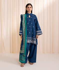 Traditional Cotton Suit With Printed Motifs, Blue Naqshi Cambric Dupatta, Traditional Cotton Suits With Printed Motifs, Traditional Wedding Suits With Printed Motifs, Blue Naqshi Lawn Suit In Cambric, Blue Cambric Salwar Kameez With Naqshi, Blue Cambric Lawn Suit With Naqshi Detailing, Suits With Printed Motifs For Wedding And Eid, Wedding Suit With Printed Motifs For Eid