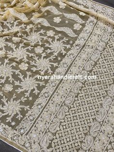 Beautiful Chikankari (famous hand embroidery style from Lucknow, City of Nawabs, India) on georgette. Designer embroidery all through the saree. Includes an embroidered blouse piece too. Fall Attached and Petticoat included!! Luxury Festive Shawl With Chikankari Embroidery, Luxury Traditional Scarves With Chikankari Embroidery, Luxury Summer Chikankari Embroidery Dupatta, Luxury Chikankari Embroidery Saree For Navratri, Luxury Chikankari Embroidery Shawl Fabric, Georgette Dupatta With Motifs For Reception, Reception Georgette Dupatta With Motifs, Chanderi Dupatta With Motifs For Reception, Wedding Georgette Traditional Wear With Motifs