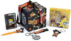 an assortment of dragon ball items including keychains, money clip and card case