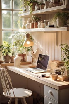 an open laptop computer sitting on top of a wooden desk next to a white chair