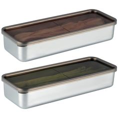 two tins with some food inside of them