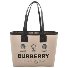 Burberry Tote. SKU: 8063121. Color: Beige. Size: H: 11.4" x W: 13.4" x D: 7.3"; Handle: 10.2". Burberry Medium Heritage Tote Bag. London medium tote bag crafted from cotton in the shades of beige with black leather trims and Check lining. It features double leather handles, print on the front, one wide main interior compartment and one interior detachable zipped pouch. Outer: Cotton 100% Lining: Cotton 55%, Linen/Flax 45% Trims: Calf Leather 100%. Made in Italy Size: H: 11.4" x W: 13.4" x D: 7.3 Burberry Tote, Medium Tote Bag, Craft Tote Bag, Shades Of Beige, Girly Accessories, Burberry London, Medium Tote, Satchel Handbags, Leather Handles