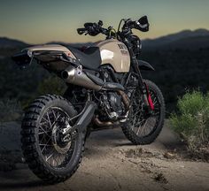 a dirt bike parked on the side of a road