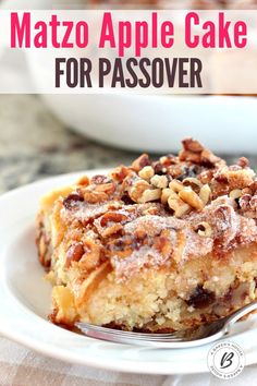 apple cake for passover on a white plate with a fork and bowl in the background