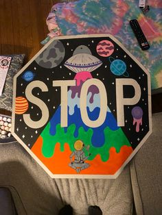 a stop sign painted on the back of a chair