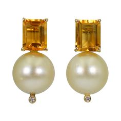 5.44 carat emerald-cut Citrine with round, champagne or golden color 14mm Freshwater Pearl drop and accent Diamonds 14k yellow gold stud earrings. Stud earrings are 1.07 inches or 27mm in length. Gorgeous, sunny Citrine and Pearl gemstones make these timeless yet contemporary earrings versatile to be worn casually or dressed up. Yellow Gold Stud Earrings, Contemporary Earrings, Color Champagne, Gold Stud Earrings, Minimal Jewelry, Pearl Gemstone, Earrings Stud, Women Diamond, Pearl Diamond