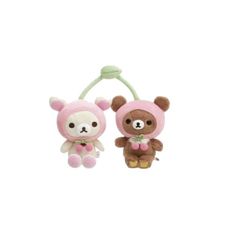 two small stuffed animals are hanging from a hook on a white background, one is pink and the other is brown