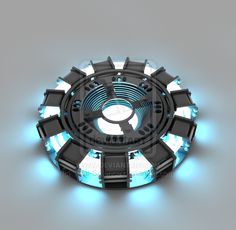 an abstract circular object with blue lights on the sides and black metal parts around it