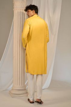 Yellow kurta with floral embroidered placket, cuff and scattered buttis. Comes with contrasting pyjama pant. - Aza Fashions Cotton Kurta With Embroidered Cuffs Long Sleeve, Cotton Kurta With Embroidered Cuffs, Fitted Long Sleeve Kurta With Embroidered Cuffs, Cotton Silk Kurta With Embroidered Sleeves, Eid Long Sleeve Kurta With Embroidered Cuffs, Long Sleeve Kurta With Embroidered Cuffs For Eid, Long Sleeve Cotton Silk Kurta With Embroidered Sleeves, Traditional Festive Lawn Suit With Embroidered Sleeves, Cotton Straight Kurta With Embroidered Sleeves