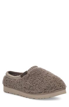 Exceptionally plush and indulgently comfortable, this fan-favorite slipper wrapped in thick curls of genuine shearling features a signature UGGbraid rope framing the collar and a lightweight sole made of sugarcane EVA. It's lined with cushy, warm UGGplush, a moisture-wicking textile made from a wool-rich blend but crafted to feel and wear like genuine shearling. Genuine shearling upper/UGGplush wool-blend lining/synthetic sole Shearling may be sourced from Australia, Ireland, Spain, the UK or th Rope Frame, Shearling Slippers, Ugg Tasman, Mens Slippers, Moisture Wicking, Wool Blend, Men's Shoes, Spain, Slippers