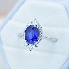 The default design option features 9x7mm Ethically Lab-Grown Royal Blue Sapphire Oval Cut, VVS1-Clarity, VG-Cut, Ex-Polish, VG-Symmetry in 14K White Gold Engagement Ring. Model 461-9x7 For Matching Band - Click Here! Also you can fully customize and engrave this ring by clicking the button "Personalize in 3D". As well please remember it takes up to 19-21 days to make and ship this item. Oval Moissanite Halo Ring, Oval Sapphire Moissanite Jewelry, Oval Cluster Ring With Cubic Zirconia For Proposal, Oval Cubic Zirconia Cluster Ring For Proposal, Oval Lab-created Sapphire Diamond Ring, Sapphire Marquise Ring With Halo Setting, Oval Lab-created Sapphire Halo Ring For Anniversary, Oval Moissanite Cluster Ring In Fine Jewelry Style, Sapphire Rings With Marquise Halo Setting