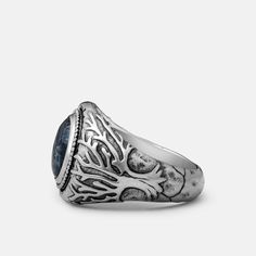 This ring, designed in collaboration with Peter McKinnon, is adorned with a Blue Pietersite stone and features imagery of a tree taking root. Beyond being a symbol of Canada’s impressive natural landscape, the tree roots are also a reminder to dig in and enjoy the ride. Sterling Silver. Crafted with Blue Pietersite from Africa and Asia. Each stone is unique and will vary from what is pictured here. Nature-inspired Rings With Polished Finish, Badass Rings, Peter Mckinnon, Pietersite Stone, Enjoy The Ride, Woven Chain, Tree Roots, Natural Landscape, North Star