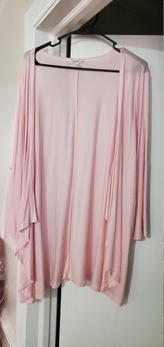 This is a beautiful light pink cardigan  in a size 1X (16W-18W)! It's airy, comfortable and lightweight! It's 32 inches in length and drapes beautifully.  Only one available! Soft Pink Cardigan, Casual Handmade Pink Cardigan, Cheap Pink Soft Knit Cardigan, Cozy Pink Cotton Cardigan, Vintage Pink Winter Cardigan, Light Pink Cardigan, Givenchy Bracelet, Vintage Givenchy, Coldwater Creek