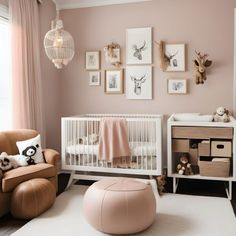 a baby's room with pink walls and pictures on the wall