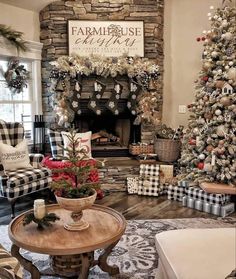 a living room filled with furniture and a christmas tree in front of a fire place