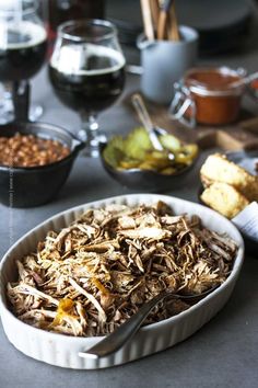 a bowl filled with food sitting on top of a table