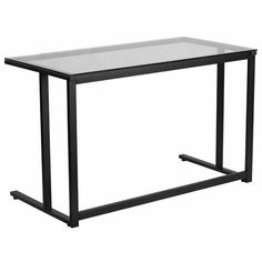 a glass and metal desk with black legs