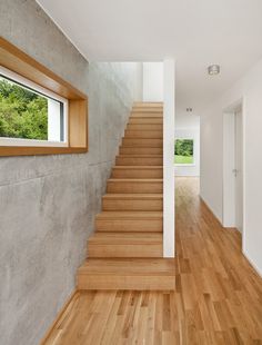 the stairs are made of wood and concrete