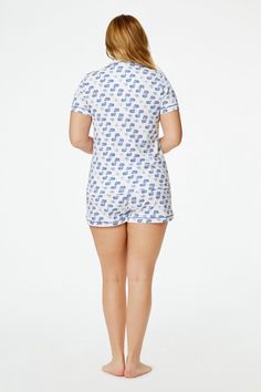 Add a fresh update to your polo sleepwear with our Moby the Whale print! This new version of the original Moby print is designed to bring an updated cult classic to your pajama drawer. Featuring shorts and a matching short-sleeve button-up top, this pima cotton pajama set is made for a breezy feel on those warmer nights. 4 Buttons Breast Pocket Elastic Waist Materials and Care 100% Premium Cotton Machine wash warm with like colors. Do not bleach Line Dry recommended. Warm iron if needed Imported Cotton Pajama Set, Whale Print, Roller Rabbit, The Whale, Cotton Pajama Sets, Shipping Orders, New Version, Short Sleeve Button Up, Classic Pattern