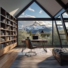 a room with a desk, bookshelf and window overlooking the snow covered mountains