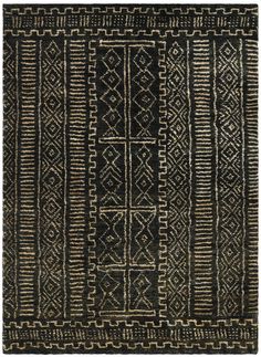 a black and white rug with an intricate design