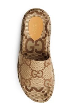 Luxury Slides With Platform And Round Toe, Luxury Platform Slides For Summer, Luxury Platform Slides, Gucci Cushioned Slide Sandals, Gucci Cushioned Slides, Gucci Slip-on Mules, Gucci Sandals With Woven Sole For Summer, Gucci Slides With Cushioned Footbed, Gucci Open Toe Mules With Branded Insole