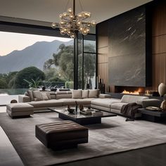 a living room with a large sectional couch and coffee table in front of a fireplace