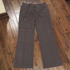 Ab Studio Pinstriped Dress Pants Brown Size 6. Never Worn Tailored Striped Pants With Pockets, Fitted Striped Pants For Office, Fitted Bottoms With Striped Hem For Spring, Casual Striped Pants For Office, Striped Fitted Bottoms For Formal Occasions, Elegant Striped Bottoms With Pockets, Formal Striped Fitted Bottoms, Striped Fitted Dress Pants For Business Casual, Fitted Vertical Stripes Pants For Office