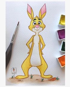 a drawing of a cartoon rabbit with colored crayons next to it