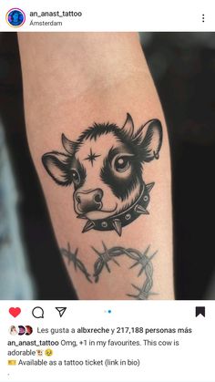 a small pig tattoo on the arm