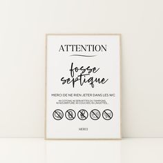 a white poster with black writing on the front and back of it that says attention