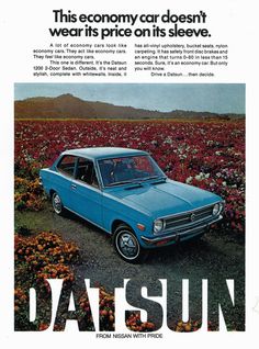 an advertisement for the datsun automobile company, featuring a blue car in a field